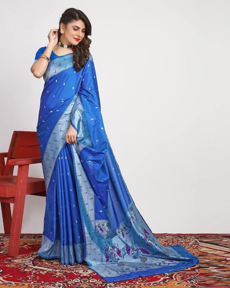 Peacock blue Banarasi silk saree with zari border and all over butties |  Blue silk saree, Blue saree, Saree trends