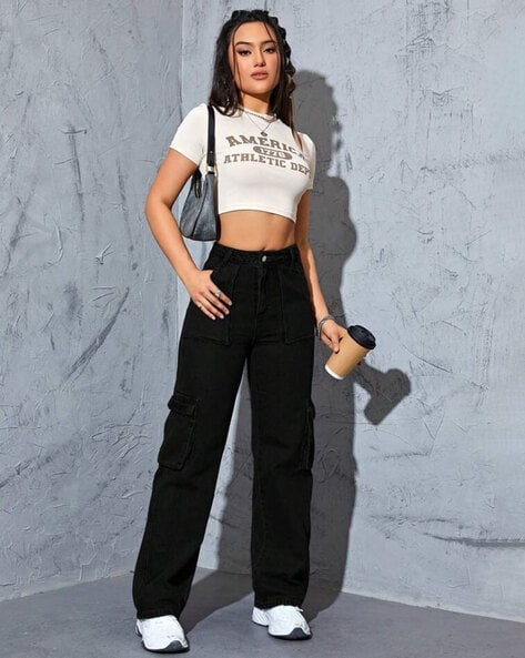 Pics: Janhvi Kapoor pulls off a cool and casual look in green cargo pants  with a white crop top | Hindi Movie News - Times of India