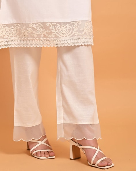 Al Karim Exclusive Fabric Store - Shop Online ▻http://bit.ly/2tsI2gM  Product Code : Trouser Tulip border - FOAN Fabric : Cotton Price : 850 PKR  Size : S,M,L,XL DETAILS : COTTON TROUSER WITH