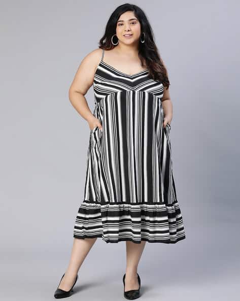 plus size black and white striped dress Universal Standard Crescent Breton Stripe Knot Lay flat to dry Midi Dress Black And White