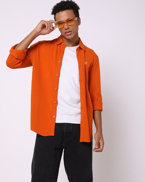 orange button up shirts