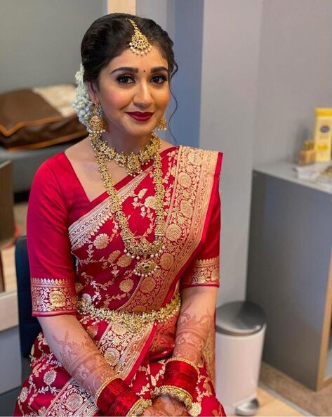 Red South Indian Sarees for Brides | Bridal sarees south indian, Wedding  saree blouse designs, Wedding blouse designs