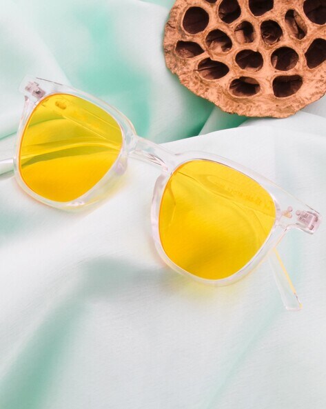 Premium Photo | White glasses with dripping pink paint on a blue background  a creative summer concept