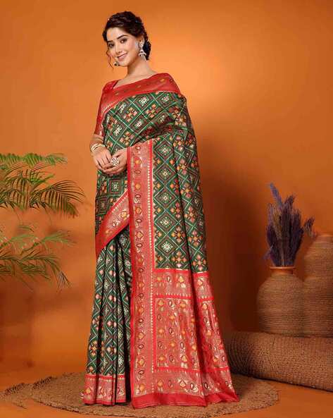 Premium Photo | Green and orange color combination saree with green and  orange stripes on the saree