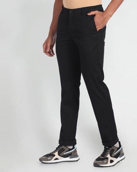 Buy Arrow Sports Men Black Low Rise Solid Casual Trousers - NNNOW.com