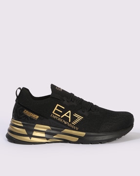 Ea7 sneakers black discount gold