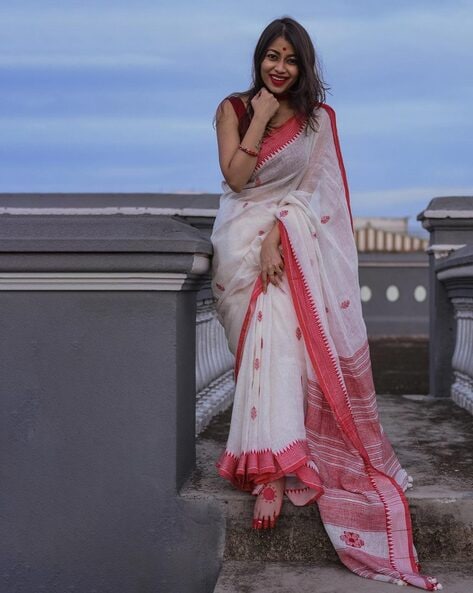 Shop White Kanjivaram Silk Saree with red border At 15% OFF