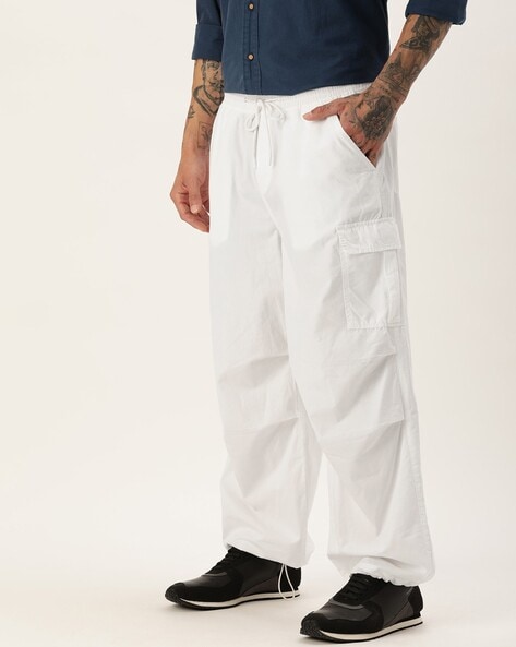 Tommy Jeans Aiden Loose Fit Garment Dyed Cargo Trousers In Off White for Men