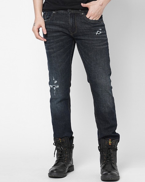 Stay Stylish this Summer with Trendy Ripped Jeans for Men