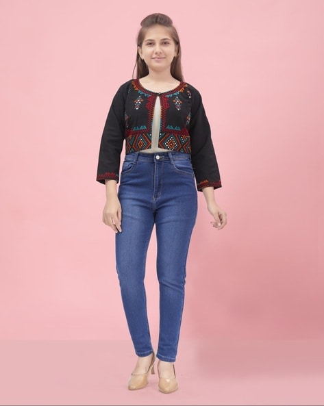 An Asian girl in jeans jacket and shorts posing open hands front of the  camera Stock Photo | Adobe Stock