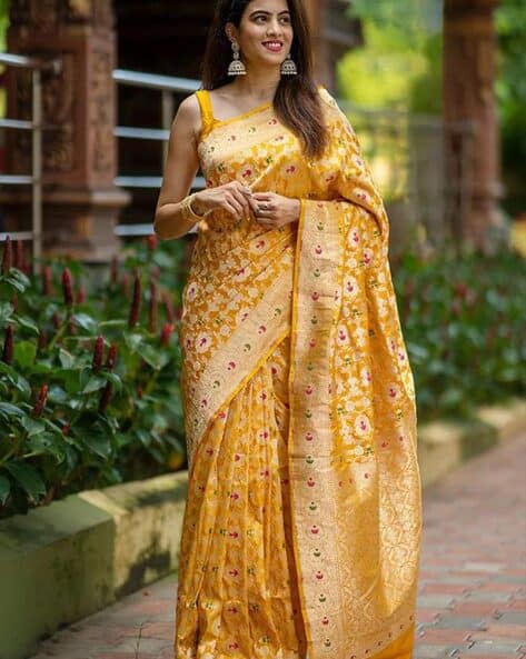 yellow saree with gold blouse