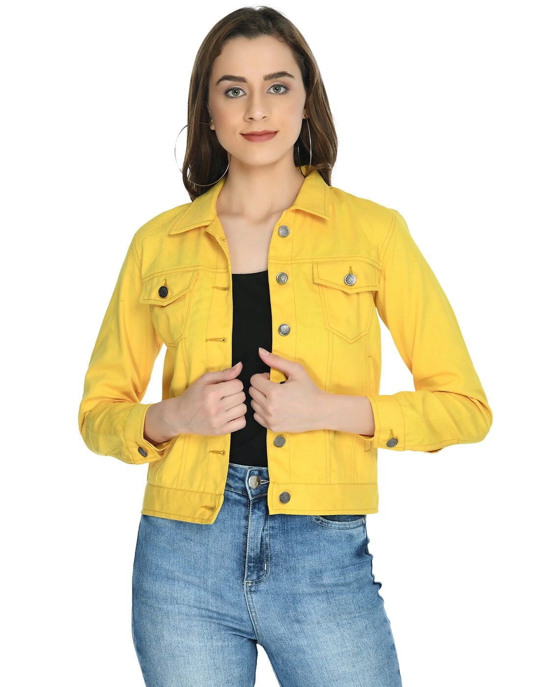 Cheerful stylish girl wearing denim jacket and white casual shirt standing  over yellow background, touching her hand, having brown straight hair, copy  Stock Photo - Alamy