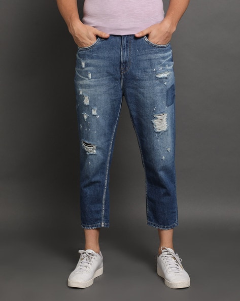Loose-fit jeans with tears