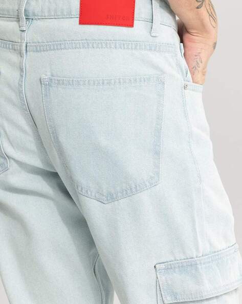 Distressed denim cargo pants in blue - Acne Studios