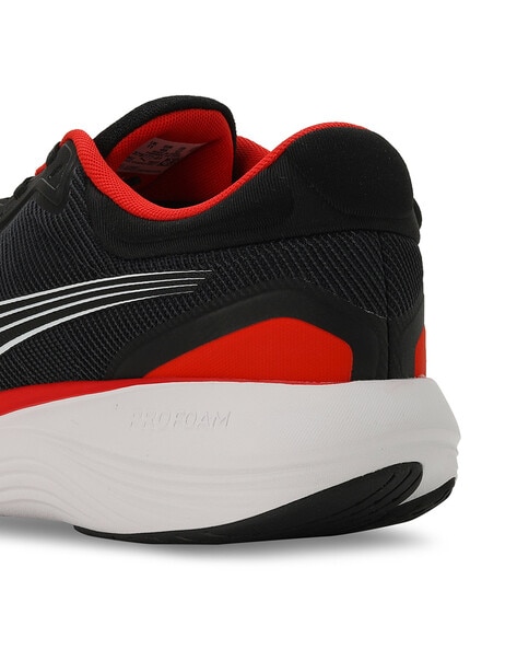 Black sports best sale shoes flipkart