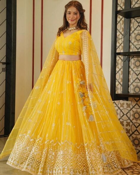 Yellow Heavy Wedding Lehenga Choli at best price in Surat by HD Bazaar |  ID: 8732447897