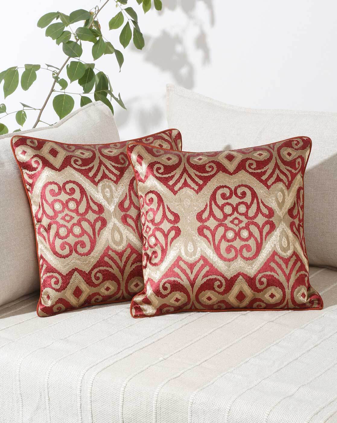 Maroon and 2024 gold throw pillows