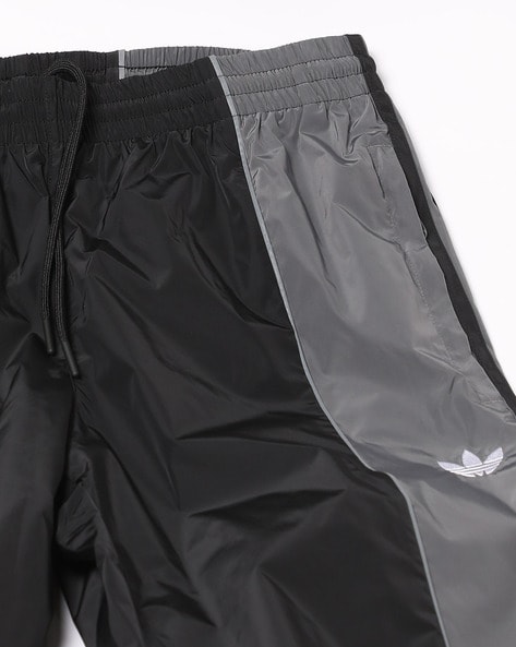 Adidas shiny online joggers