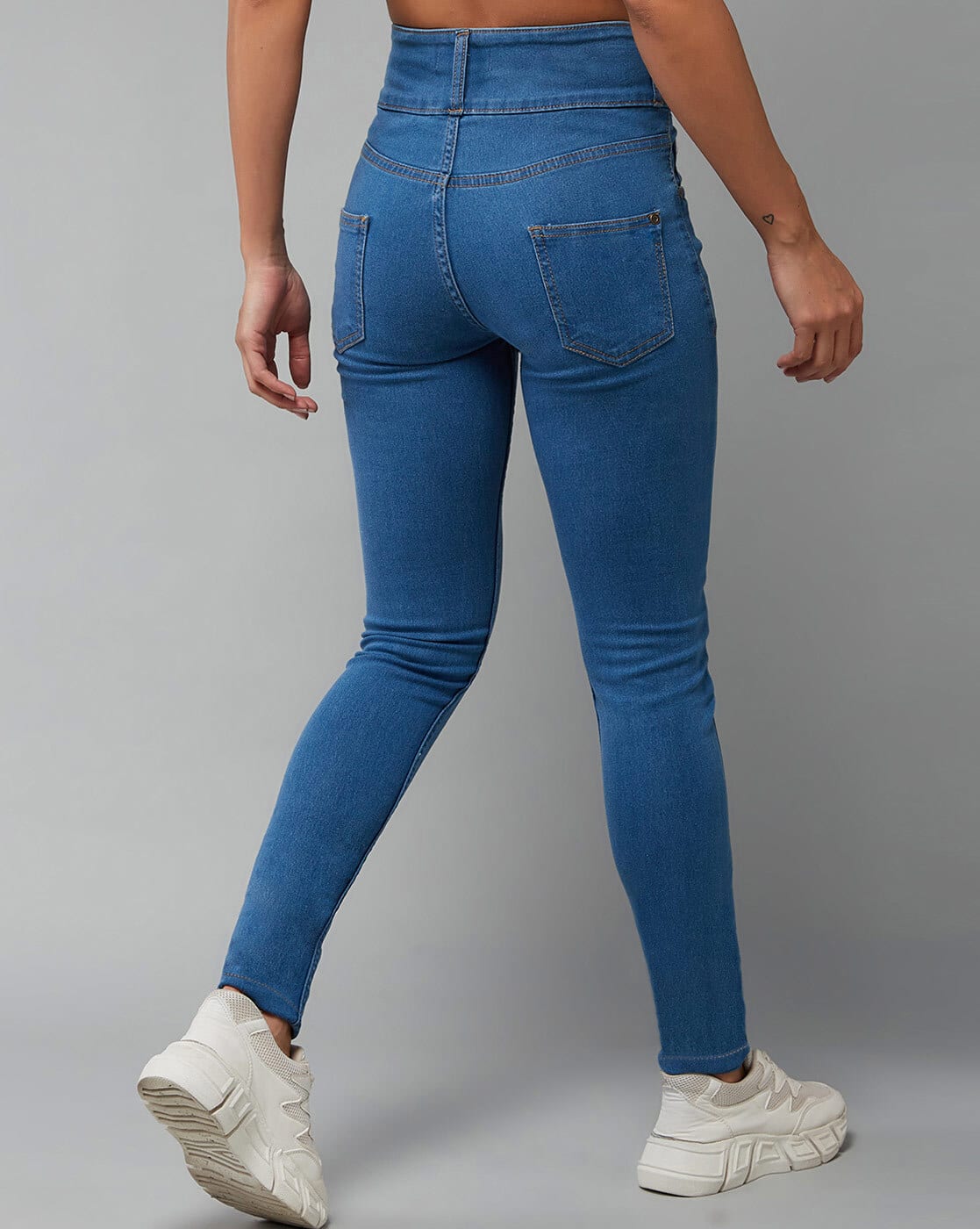 High Waisted Women In Tight Blue Jeans PLT Shape Light Blue Wash