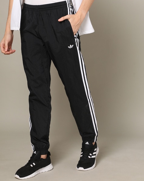 adidas Originals Adicolor firebird track pants in black | ASOS-seedfund.vn