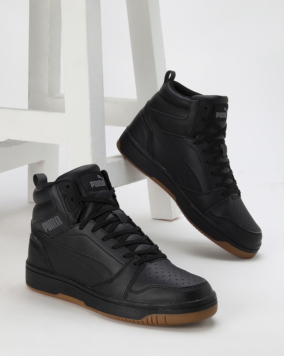 Puma rebound black clearance sneakers