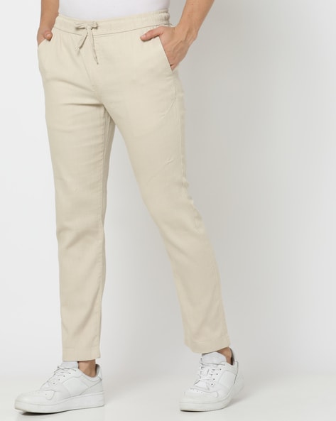 Buy Light Grey Trousers & Pants for Men by DNMX Online