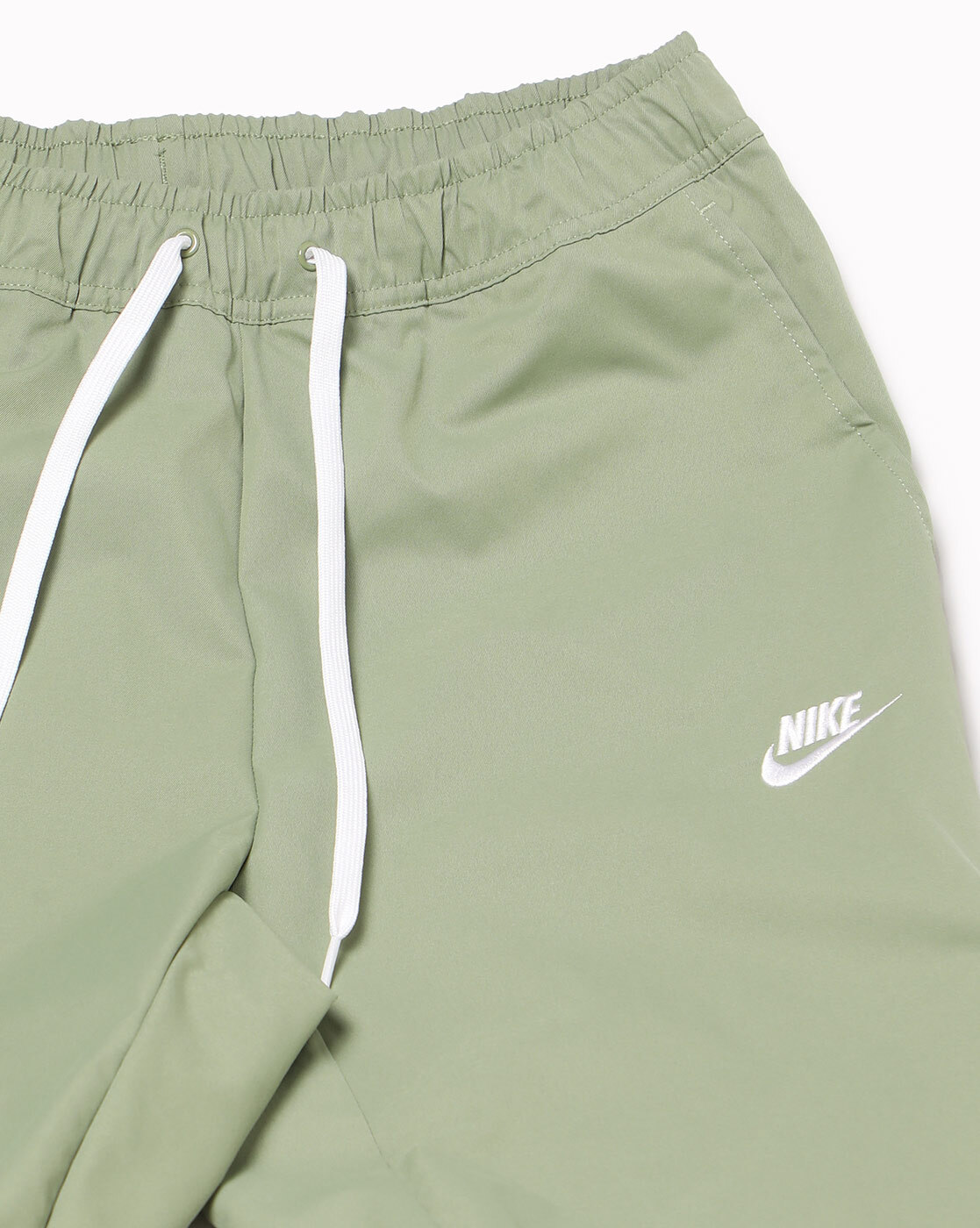 Nike track pant discount shorts