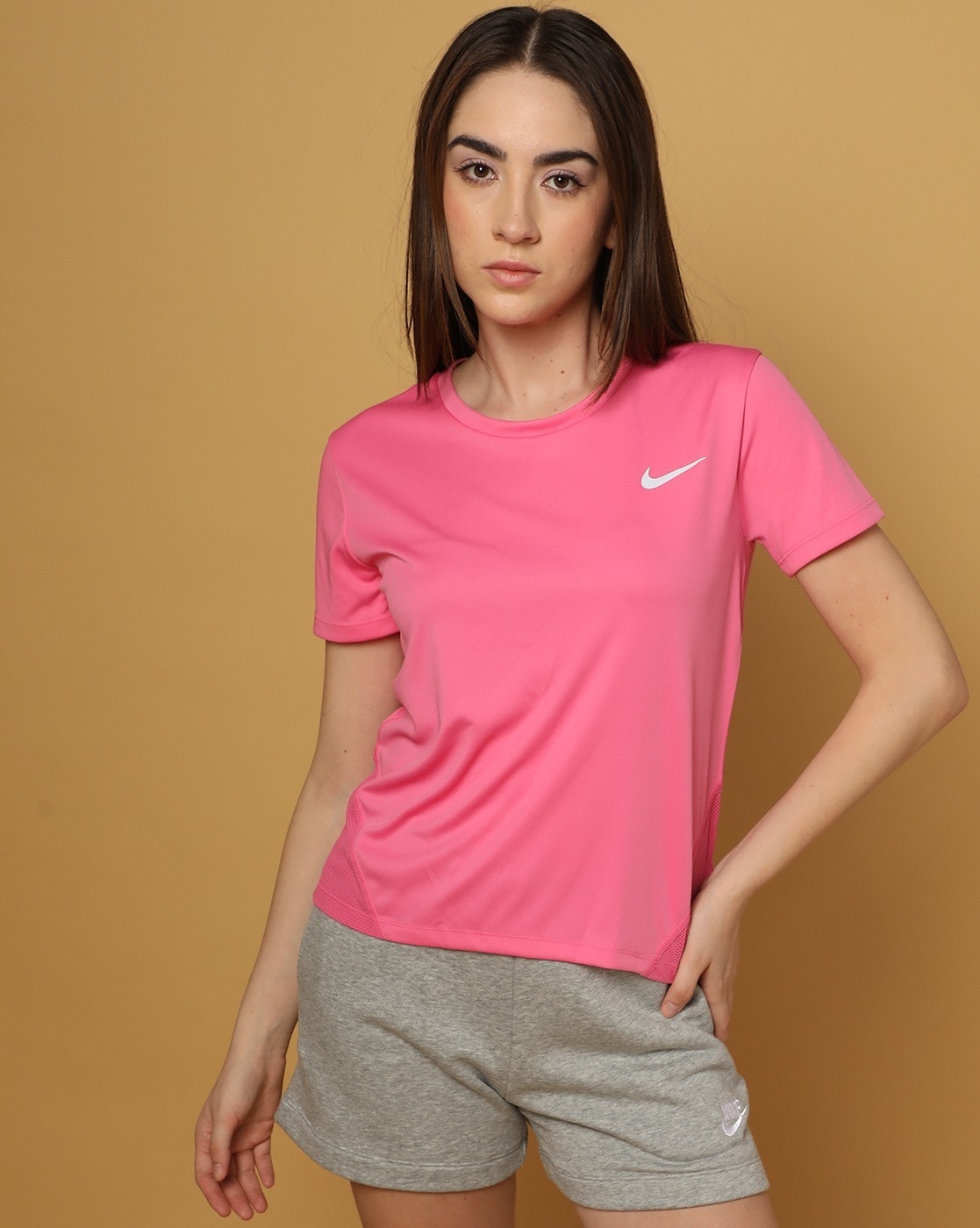 NIKE Women's Dri-Fit Miler Running Top-Peach-XS  Nike women, Womens  clothing websites, Short sleeve shirt women