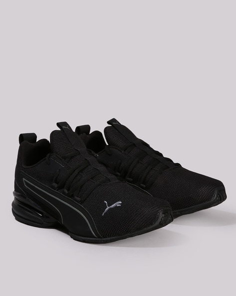 Puma axelion on sale black and white