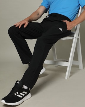 Adidas originals joggers hot sale with logo embroidery black