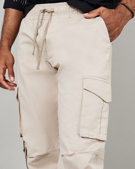 Buy Beige Track Pants for Men by Styli Online