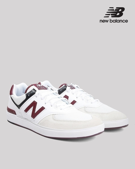 Buy new balance Men's Ck4020J4 Rubber Spike Cricket Shoes, White/Cyber Jade  - 8 Uk at Amazon.in