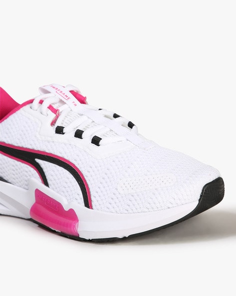 Puma pink outlet and white shoes