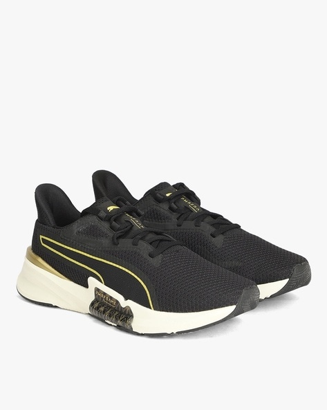 Black and gold pumas good running shoes sale