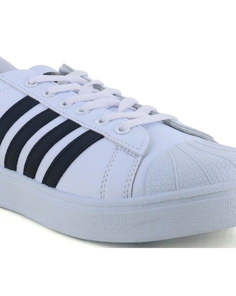 Sparx white shoes with cheap black stripes