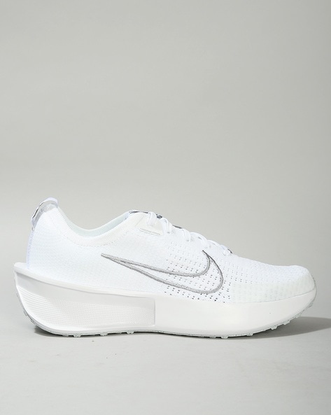 All white nike walking hot sale shoes