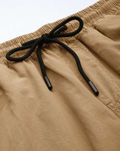 Buy Beige Trousers & Pants for Men by BENE KLEED Online
