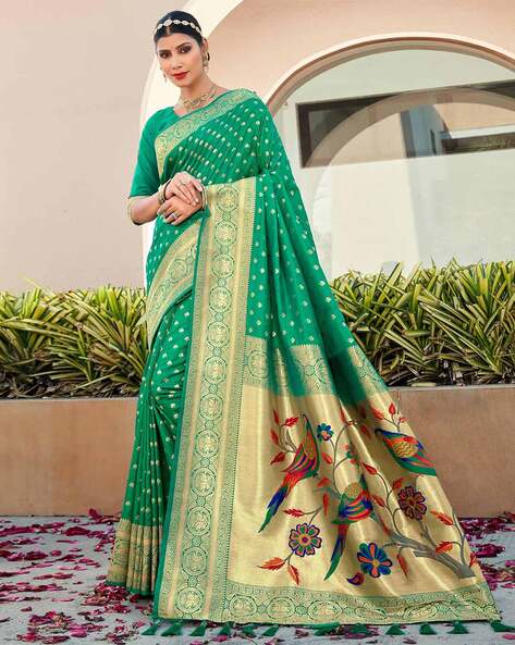 Dark green color paithani silk saree with zari woven work