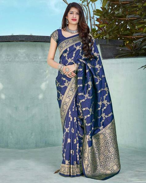 Cream Woven Patola Banarasi Silk Saree With Tassels