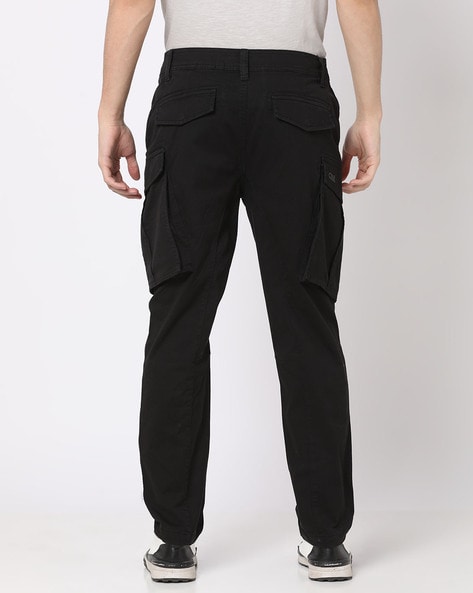 Buy Black Trousers & Pants for Men by ECKO UNLTD Online