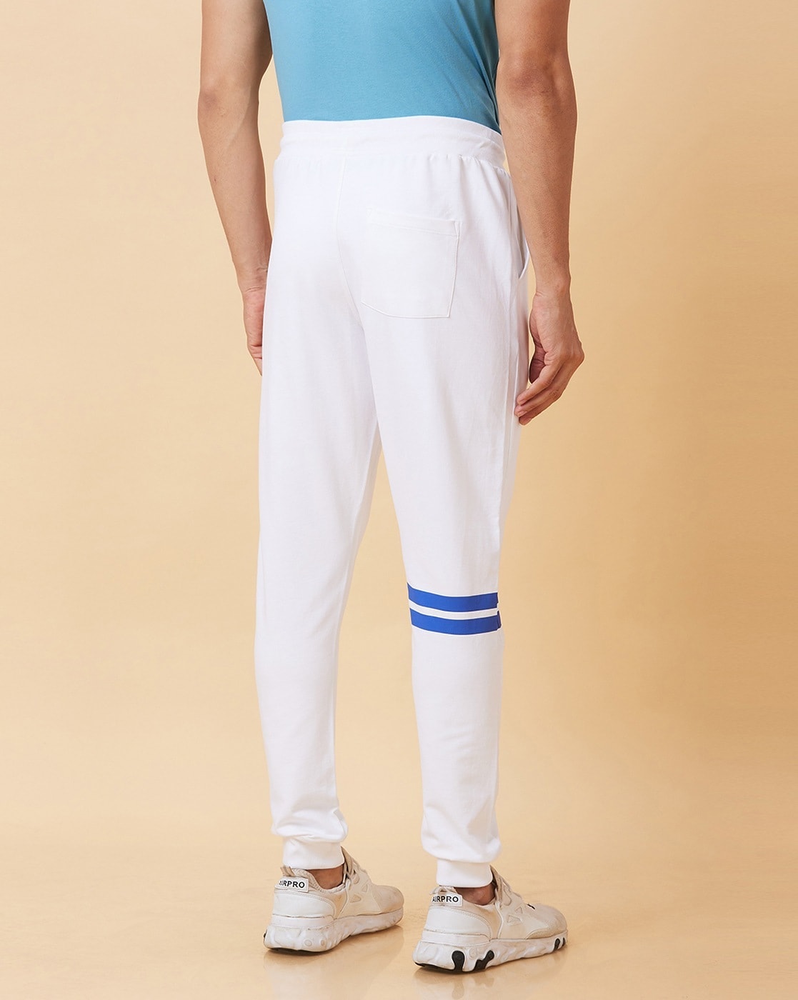 Buy Off White Track Pants for Men by Being Human Online