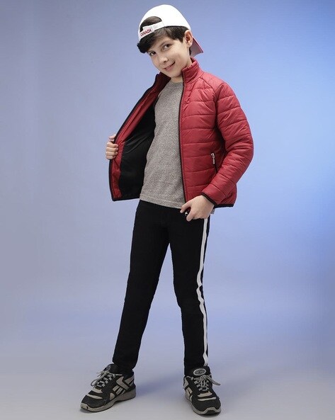 The little boy in the style of Hip-Hop . Children's fashion.Cap and jacket.  The Young Rapper.Graffiti on the walls.Cool rap dj. Stock Photo by  ©Koltsovthebest 145441427