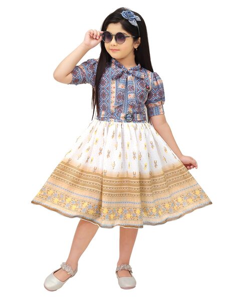 A girl dressed in traditional clothes poses for a photo during the Gudi  Padwa celebration in Mumbai. Gudi Padwa is a springtime festival marking  new year celebrations for the people of the