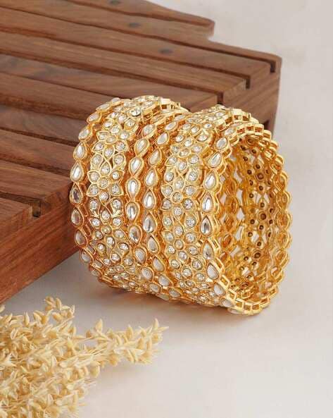 Gold covering bangles hot sale online shopping