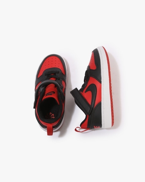 Red nike hot sale low tops