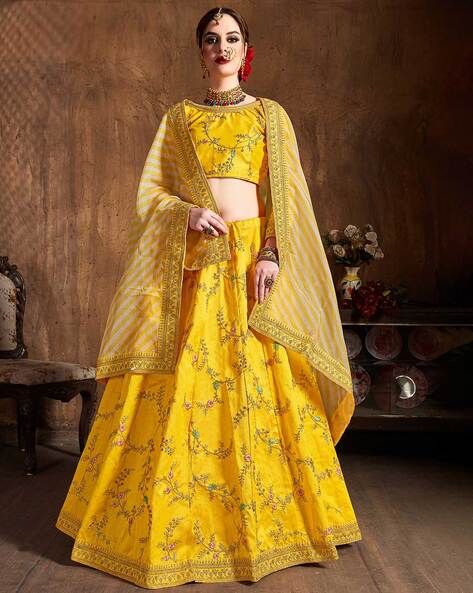 Buy Kiara lemon yellow lehenga with a blouse and dupatta.