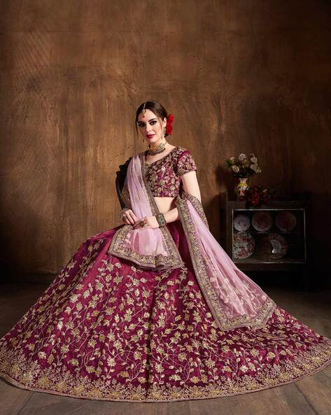 Photo of A bride in maroon lehenga with double dupatta