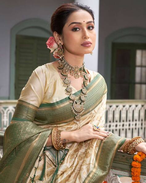 Cream organza saree with blouse 2003