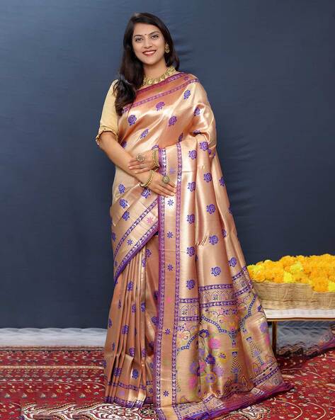 This eternally graceful kanchipuram silk saree has a bold and beautiful  colour palette of mango yellow and deep purple, with a signature ... |  Instagram