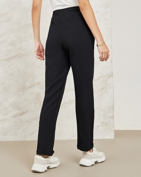 Buy Sosandar Black Luxury Velvet Tapered Trousers from Next Luxembourg